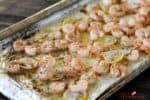 Only 4 ingredients and a few minutes in the oven and you've got dinner ready! Buttery Baked Shrimp is a perfect weeknight meal.