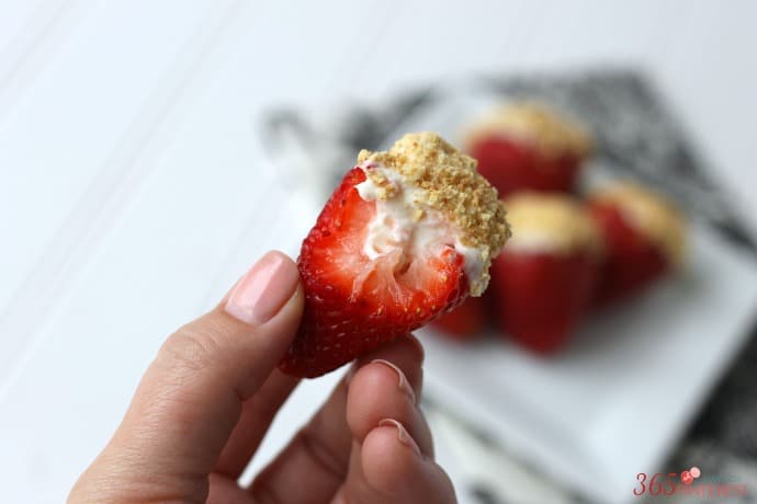 With only 5 ingredients, these cheesecake stuffed strawberries are a perfect dessert or party snack! This is a great recipe for kids to help with, too!