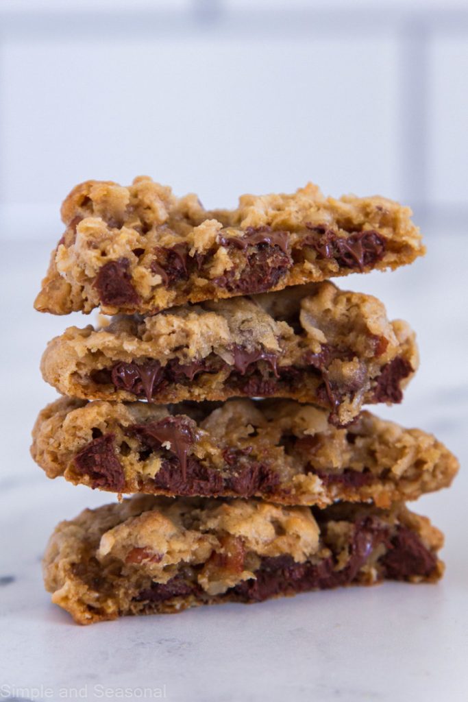 stack of four cookies opened to show melty insides