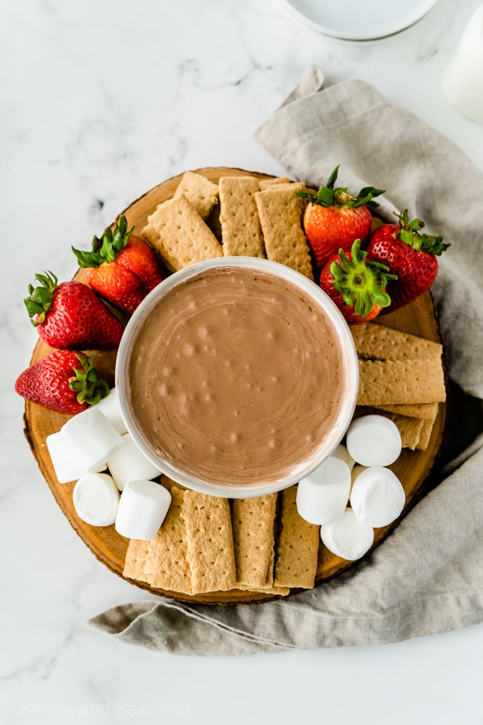 top down view of serving platter and bowl of s'mores dip