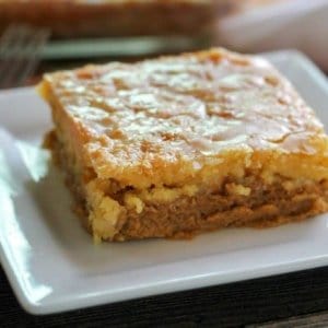 closeup on slice of layered pumpkin dump cake