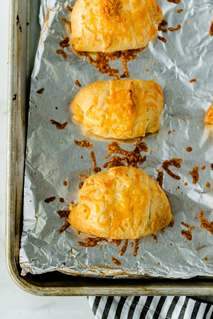 cooked puffs on baking sheet