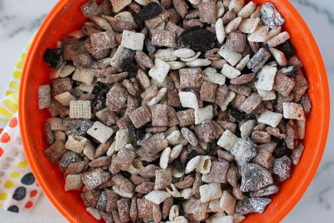 top down view of a bowl of cookies and cream chex mix