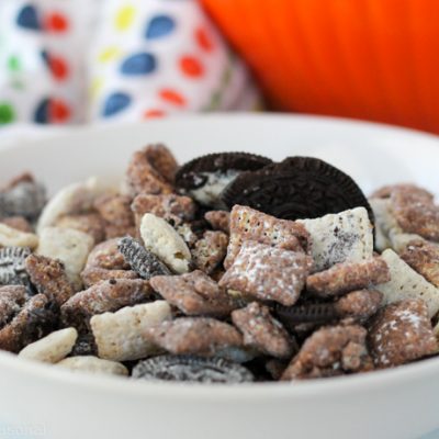 white bowl of cookies and cream chex mix ready to serve