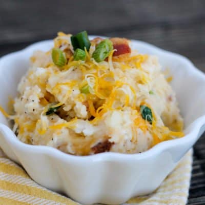 This Twice Baked Potato Casserole is like a loaded baked potato without all the work! Creamy mashed potatoes, bacon, cheese, green onions...you've got to try this!