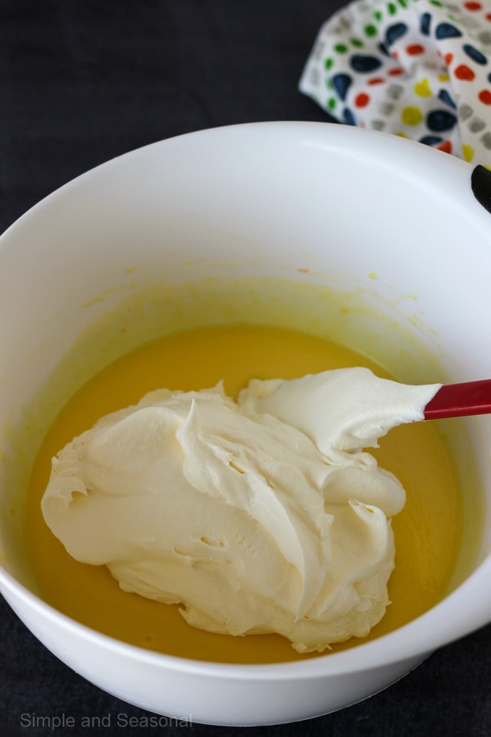 whipped topping on top of pudding mixture