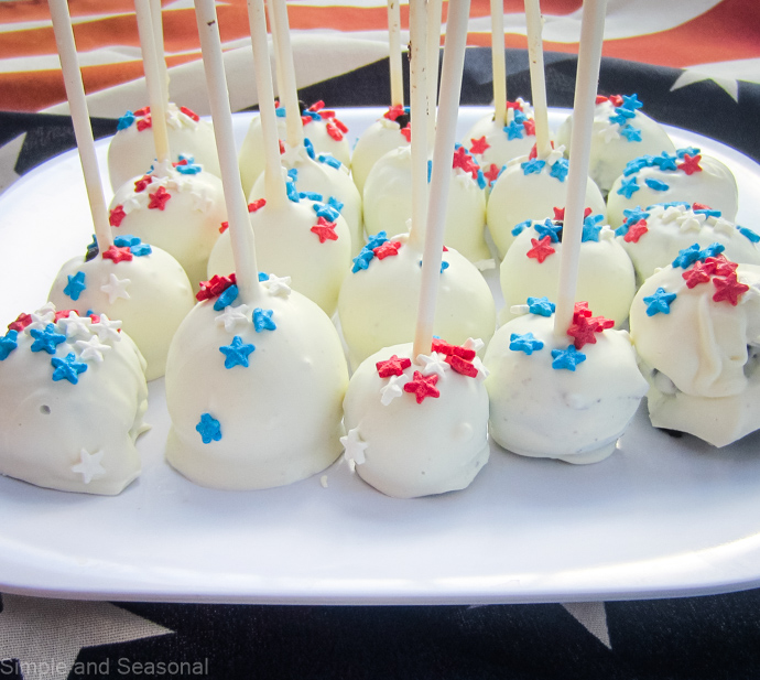 plate of oreo cookie pops decorated for 4th of July