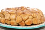 Made with frozen dinner roll dough, Rhodes Rolls Monkey Bread really is the best. The fluffy chunks of bread are covered in cinnamon and sugar and baked in a gooey, butter sauce that makes this perfect for breakfast or dessert!