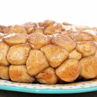 Made with frozen dinner roll dough, Rhodes Rolls Monkey Bread really is the best. The fluffy chunks of bread are covered in cinnamon and sugar and baked in a gooey, butter sauce that makes this perfect for breakfast or dessert!