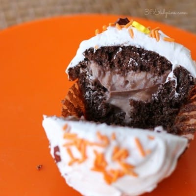 cupcake filled with pudding, cut open to show middle