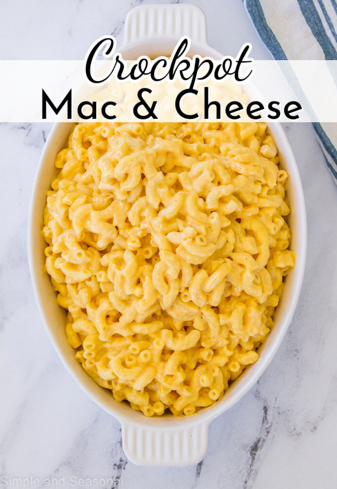 mac and cheese in a white serving bowl; text overlay reads: Crockpot Mac & Cheese