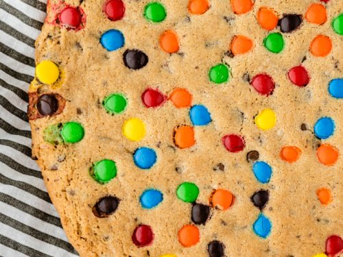 Chocolate Chip Cookie Cake with M&M's - Fun & Festive - That Skinny Chick  Can Bake