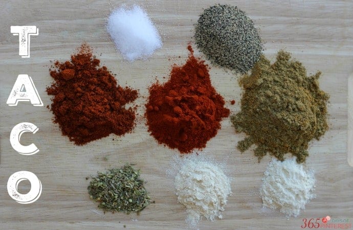 homemade taco seasoning ingredients piled on a cutting board 