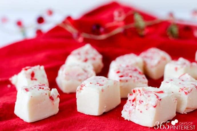 This Easy Peppermint Fudge is smooth, not too minty and doesn't require a candy thermometer to make! It's sure to be a new holiday favorite!