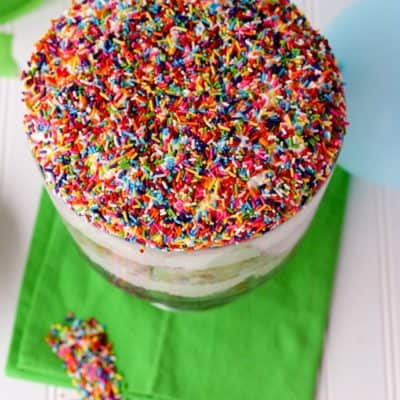 Funfetti Trifle is made with layers of delicious vanilla cake, creamy pudding filling and fun rainbow sprinkles- perfect for birthdays!