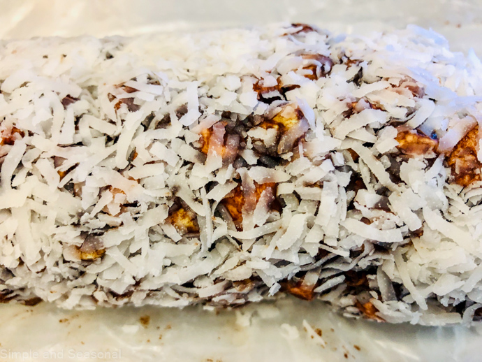 chocolate log covered in shredded coconut
