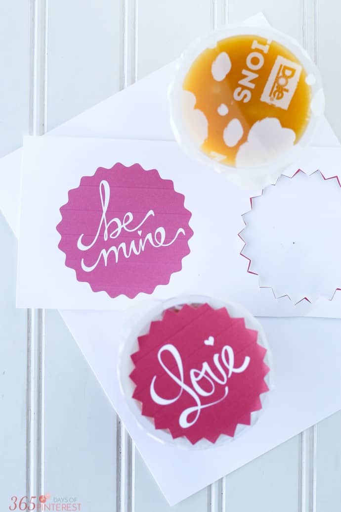 Share a fun and healthier Valentine's Day treat with these printable fruit cup toppers!