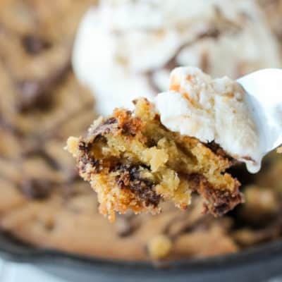 Indulge in a little "me time" with this decadent Chocolate Chip Skillet Cookie! Crispy on the edges, soft and chewy in the middle, it's the perfect sweet treat.