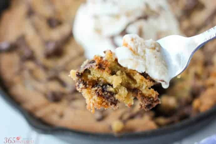 forkful of chocolate chip cookie with ice cream