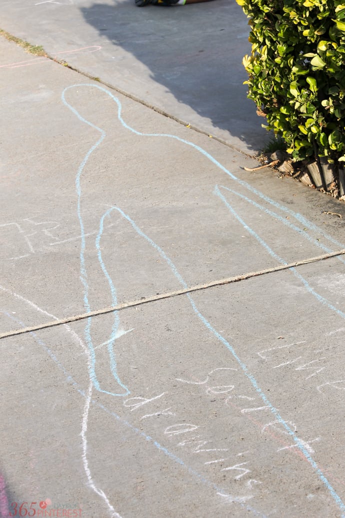 Shadow tracing with blue sidewalk chalk