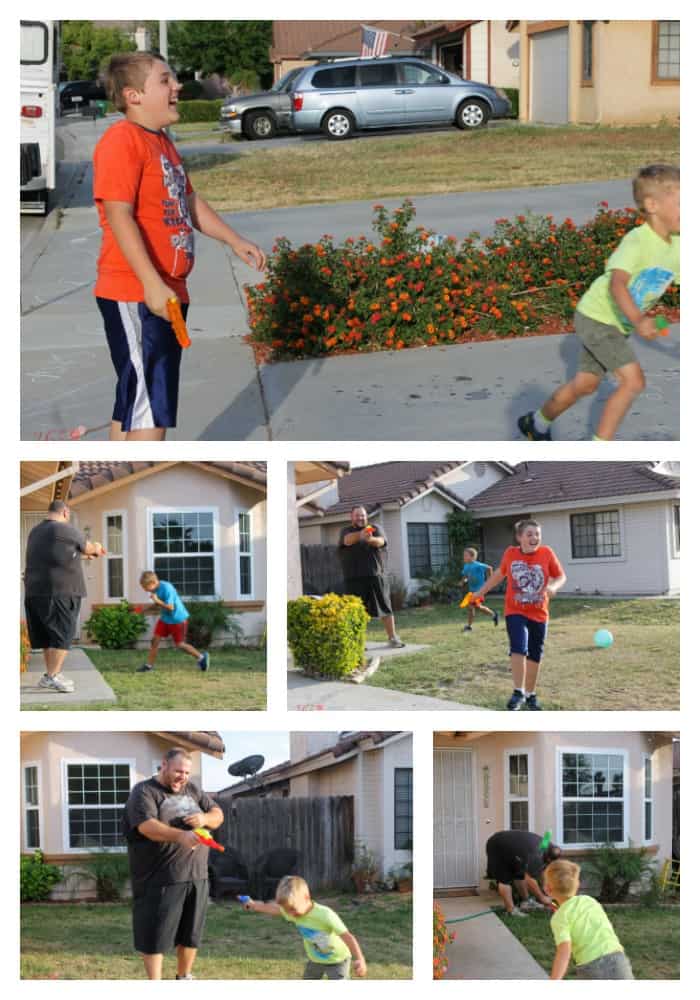 boys having a squirt gun fight