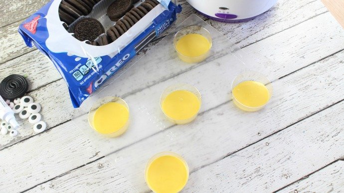 yellow melting candy in cookie molds