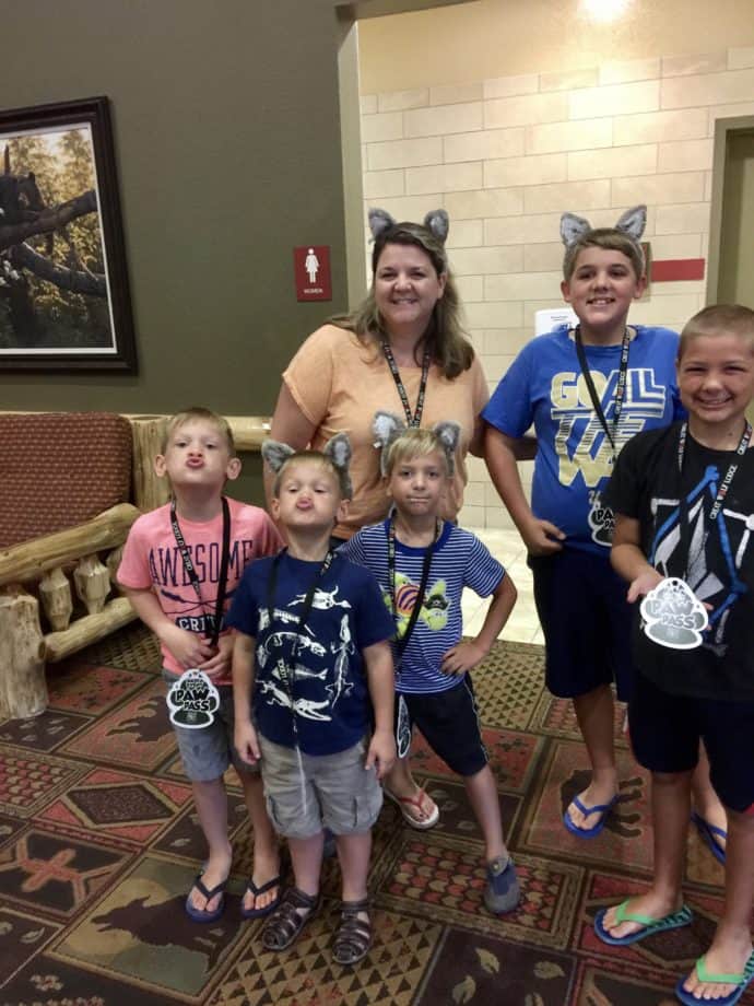 family posing inside Great Wolf Lodge