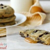 Caramel Stuffed Chocolate Chip Cookies are cookie perfection. These jumbo cookies are just begging to be enjoyed with a glass of milk on a cool fall evening! 