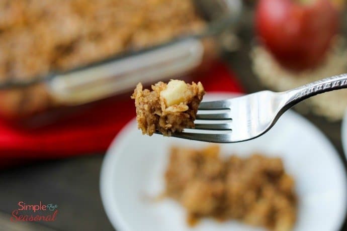 forkful of baked oatmeal with large apple chunk