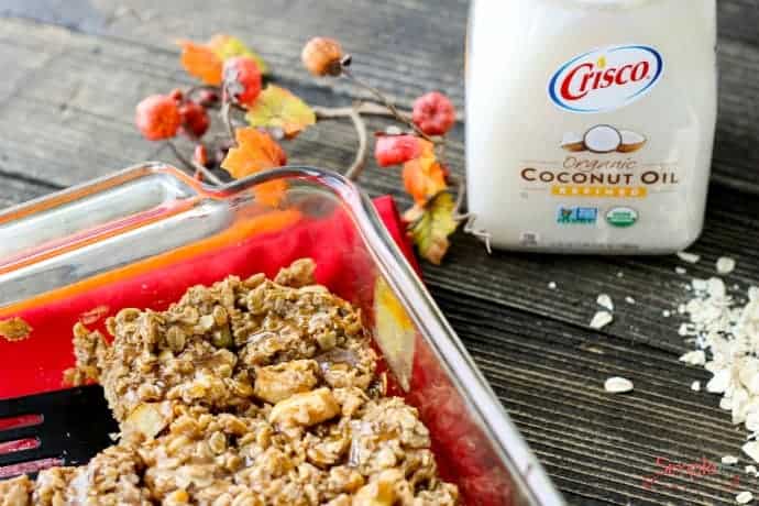 pan of baked oatmeal with Crisco coconut oil in the background