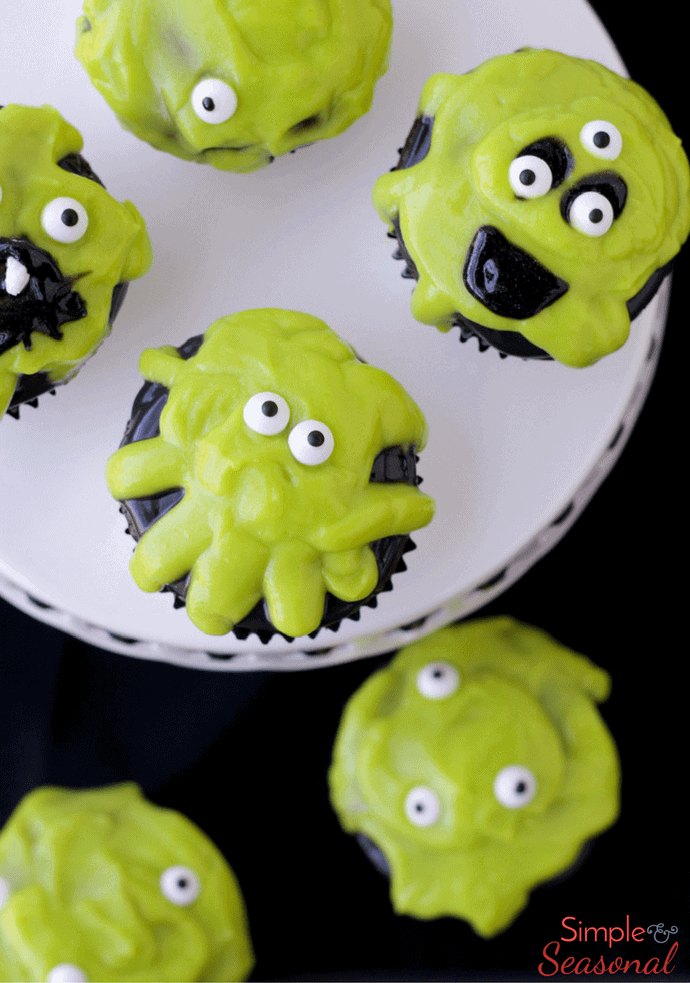 Add some ooze to your Halloween table this year with easy Slime Monster Cupcakes! They are slime-filled for a delicious gooey bite!