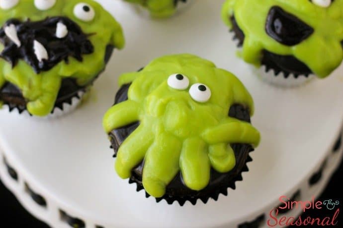 Add some ooze to your Halloween table this year with easy Slime Monster Cupcakes! They are slime-filled for a delicious gooey bite!