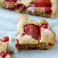 These Chocolate Strawberry Blondies are perfect for any celebration! The sweet cookie dough base is full of chocolaty goodness and the strawberries on top keep it fresh and a little tart. Strawberries and chocolate belong together any time of the year!
