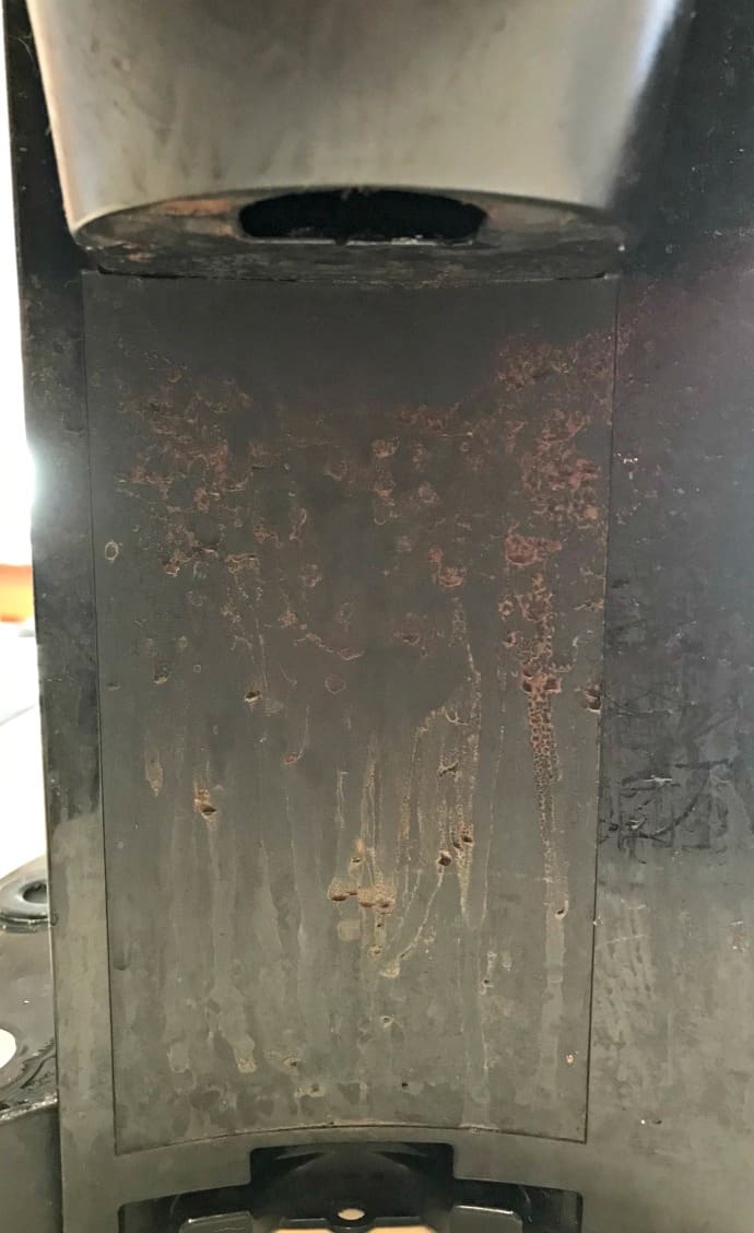dirty Keurig wall behind dispenser