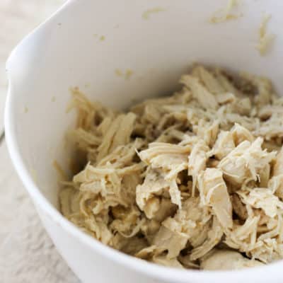 Shredded chicken breast | Make a batch of Crockpot Express Chicken Breast and get meal prep done for the week all at once! Instructions for cooking frozen chicken breasts included!