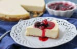 A buttery crust, velvety smooth filling and tart berry topping make this Crockpot Express Cheesecake worthy of any celebration!