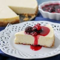 A buttery crust, velvety smooth filling and tart berry topping make this Crockpot Express Cheesecake worthy of any celebration! 