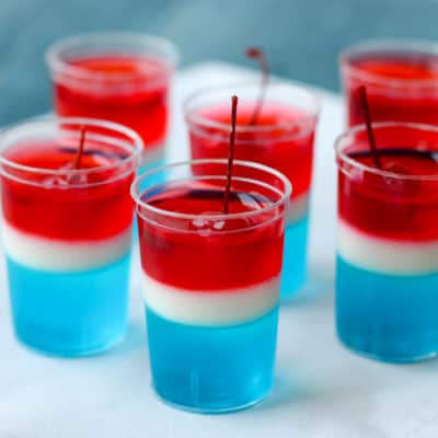 Perfect for 4th of July or Memorial Day celebrations, these Firecracker Jello Cups are a delicious pop of color on the party table!