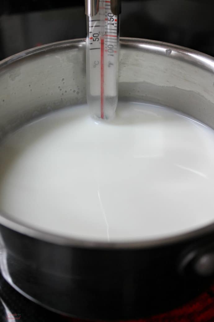 Heat water and milk until very warm-thermometer in liquid