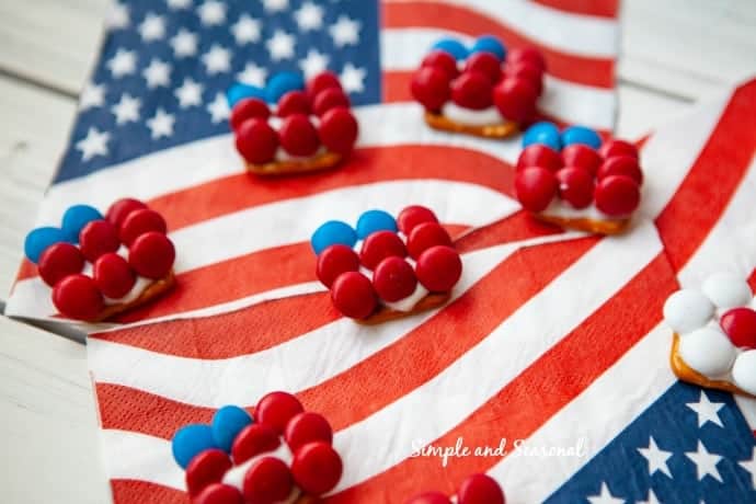 Add a festive touch to your summer table with these Patriotic Pretzel Bites. Every bite is a combination of sweet and salty!