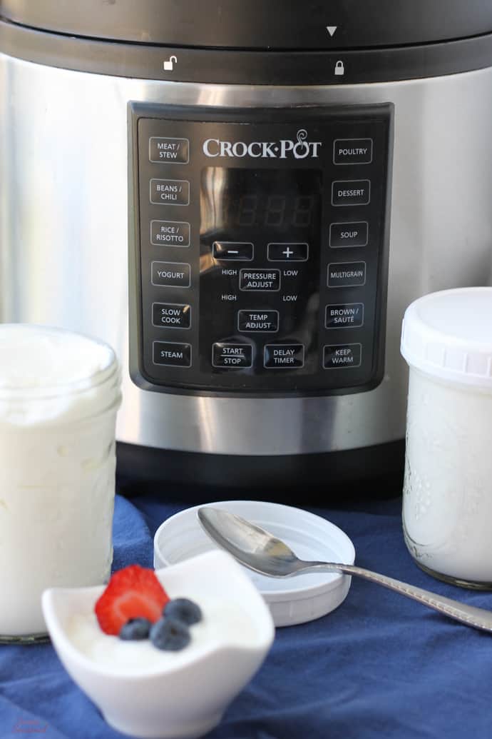 Crockpot Express multi-cooker with jars of yogurt