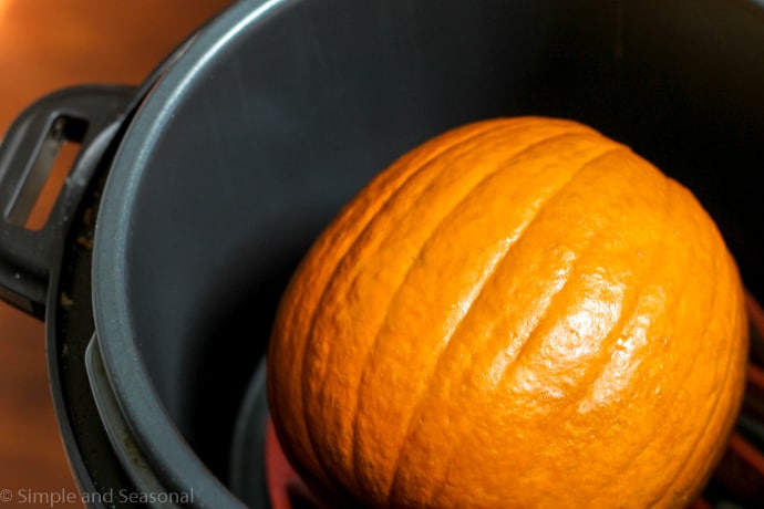 whole pumpkin inside a Crockpot Express