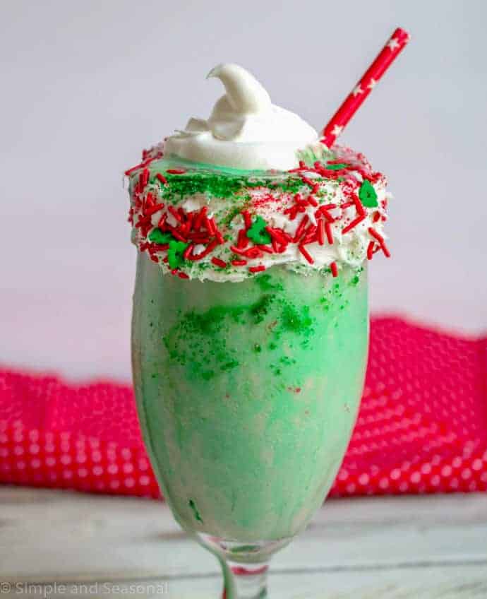 elf shake topped with dollop of whipped topping shaped to look like a hat