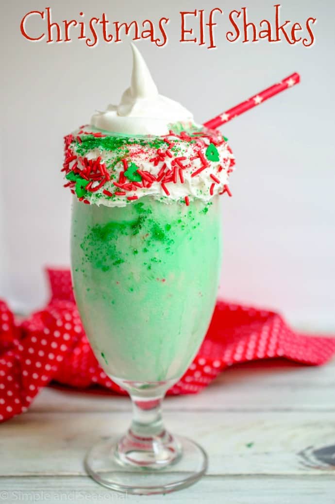 This delightful cheesecake milkshake resembles and elf with green, red, and capped with a whipped topping hat. via @nmburk