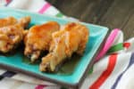 Save time without sacrificing flavor or quality with these Crockpot Express Chicken Wings! Start with frozen wings and then toss in your favorite sauce before serving!