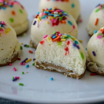 Crockpot Express Cheesecake Bites are a rich and creamy dessert in bite sized form. Make them plain or get creative with toppings!