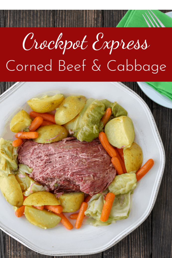 top down platter of cooked corned beef surrounded by cooked potatoes, cabbage and carrots; text overlay reads Crockpot Express Corned Beef and Cabbage