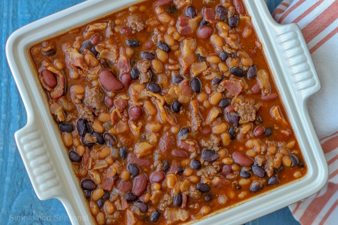 Packed with flavor, these hearty Crockpot Express Baked Beans can also be made in the slow cooker or in the oven. They are the perfect summer BBQ side dish!