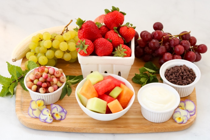 tray of supplies needed for fruit bug kabobs