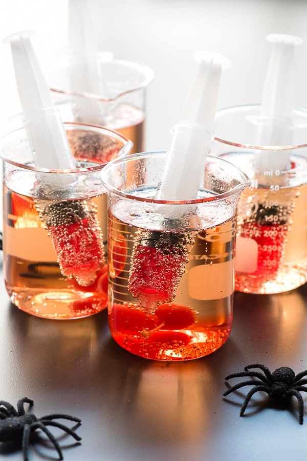 shirley temple drinks served with cherry syrup in syringes